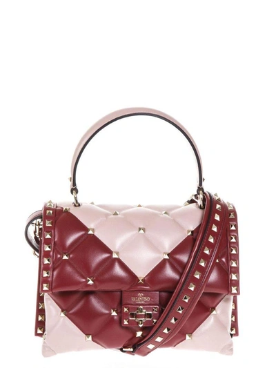 Shop Valentino Candystud Two Tone Leather Bag In Pink-red