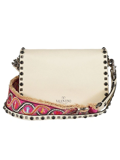 Shop Valentino Rockstud Rolling Shoulder Bag In Ilight Ivory