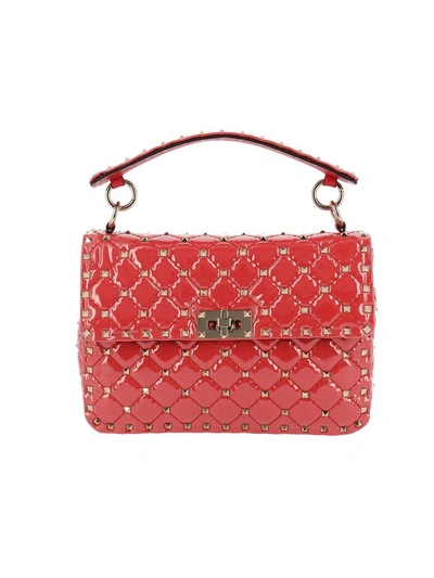 Shop Valentino Mini Bag  Rockstud Spike Bag In Pvc With Micro Studs And Shoulder Strap In Orange