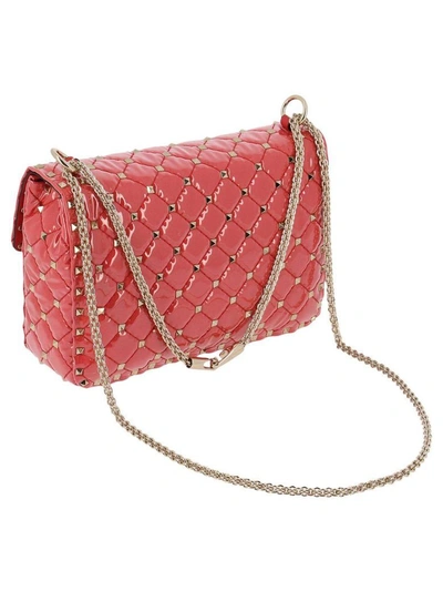 Shop Valentino Mini Bag  Rockstud Spike Bag In Pvc With Micro Studs And Shoulder Strap In Orange