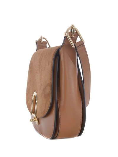 Shop Michael Kors Delfina Shoulder Bag In Cammello