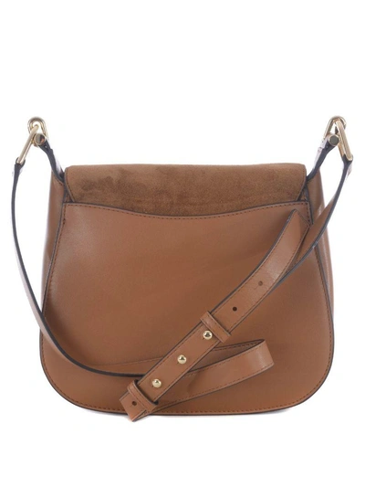 Shop Michael Kors Delfina Shoulder Bag In Cammello