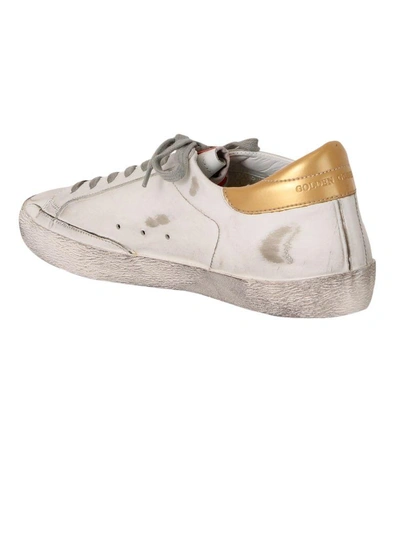 Shop Golden Goose White Gold Superstar Low Sneakers