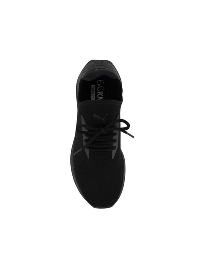 Shop Puma Avid Evoknit Sneakers In Black