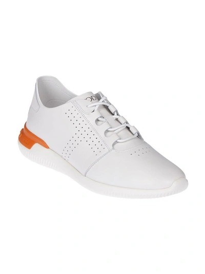 Shop Tod's Perforated Logo Sneakers In White