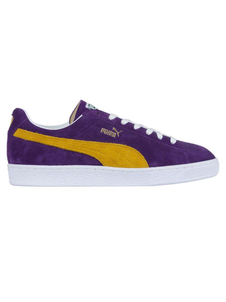 purple and yellow puma suedes