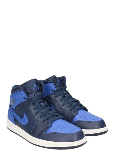 Shop Nike Air Jordan 1 Mid Blue Leather Sneakers