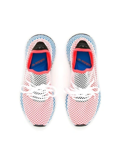 Shop Adidas Originals Deerupt Runner Sneakers In Solred Solred Blu (blue)