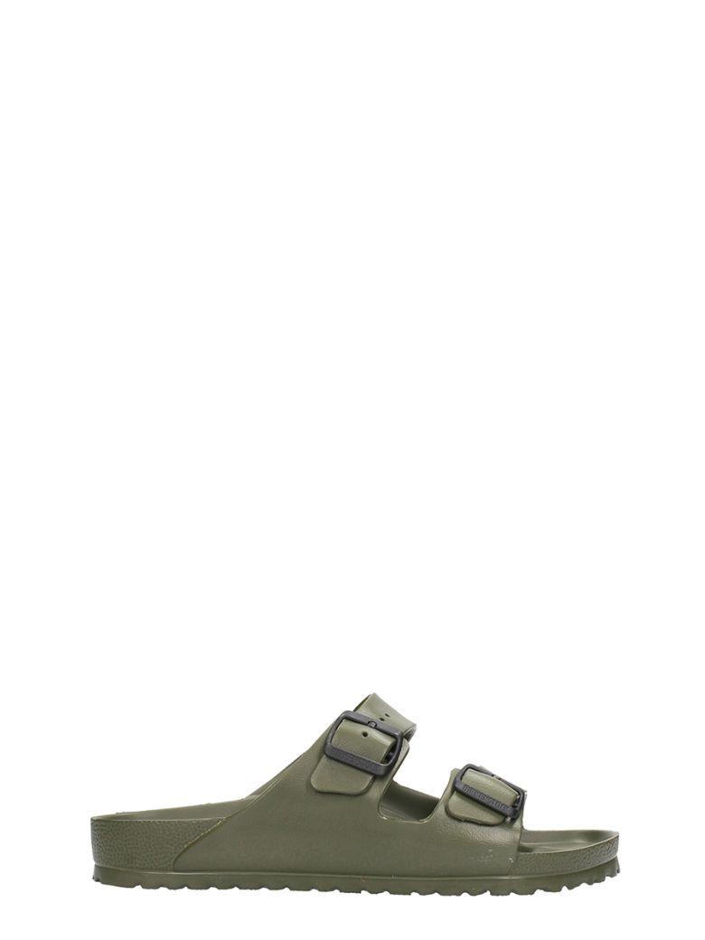 green plastic birkenstocks