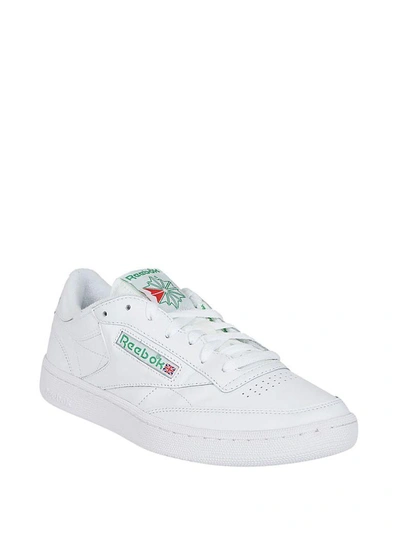 Shop Reebok Logo Sneakers In White