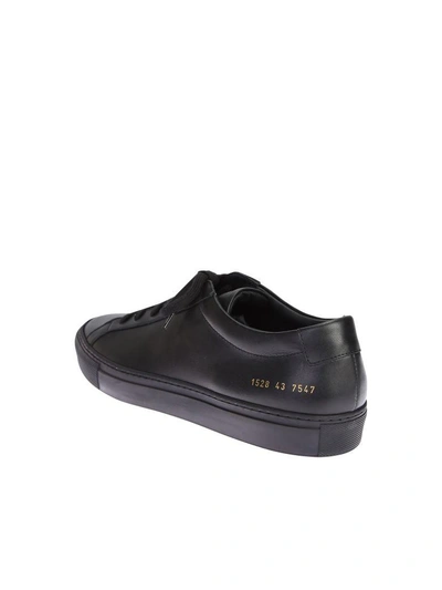 Shop Common Projects Leather Low Top Sneakers In Black