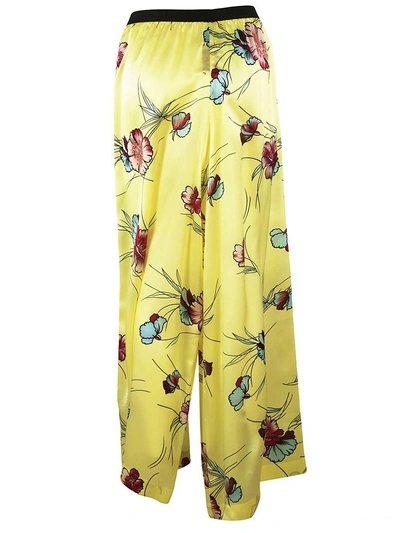 Shop Antonio Marras Floral Flared Trousers In Red-yellow