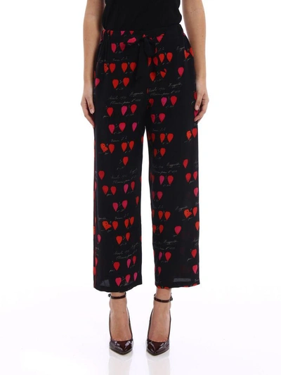 Shop Alexander Mcqueen Petal Print Trousers In Black Red Lipstick