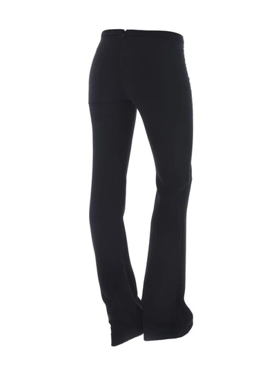 Shop Versace Trousers In Nero