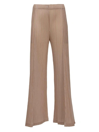 Shop Issey Miyake Fantasy Pleated Pants In Beige