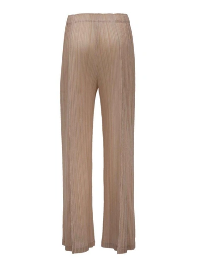 Shop Issey Miyake Fantasy Pleated Pants In Beige