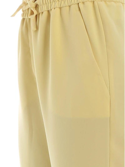 Shop Boutique Moschino Crepe Trousers In Yellow