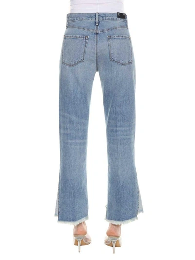 Shop J Brand Raw Edge Flared Jeans In Denim