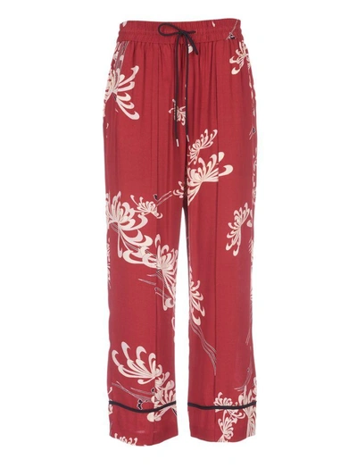 Shop Mcq By Alexander Mcqueen Mcq Alexander Mcqueen Floral Print Trousers In Amp Red