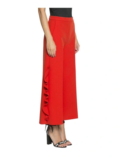 Shop Msgm Ruffled Crepe Pants In Arancio