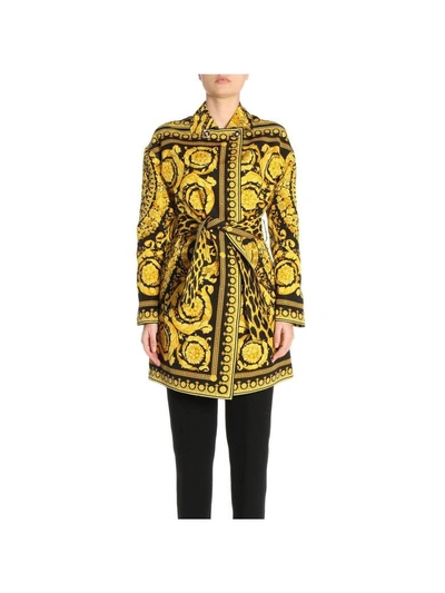 Shop Versace Coat Coat Women  In Gold