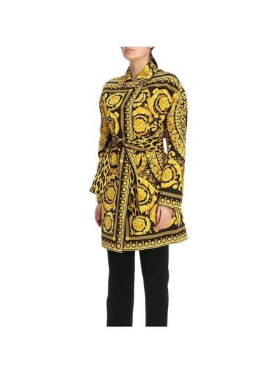 Shop Versace Coat Coat Women  In Gold