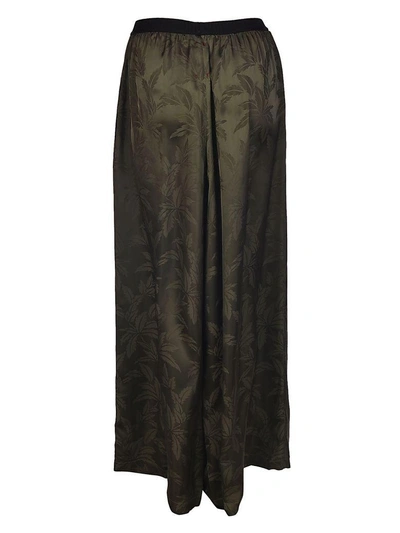 Shop Antonio Marras Leaves Print Trousers In Green