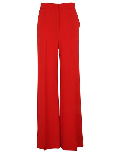 Shop Msgm Palazzo Trousers In Red