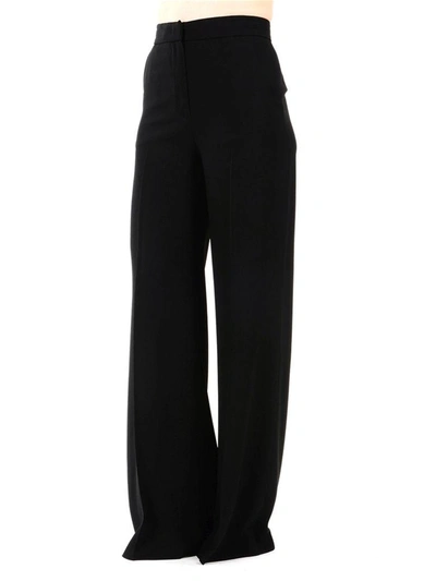 Shop Msgm Trousers In Black