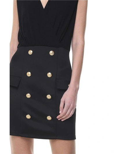 Shop Balmain V-neck Button-embellished Jersey Mini Dress In Nero