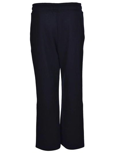 Shop Moncler Flared Cropped Track Trousers In Navy