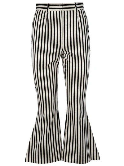 Shop Dolce & Gabbana Flared Striped Cropped Trousers In White Black