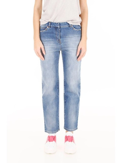 Shop Valentino Rockstud Untitled Denim Jeans In Light Blue Denim (blue)