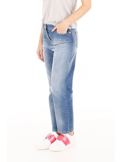 Shop Valentino Rockstud Untitled Denim Jeans In Light Blue Denim (blue)