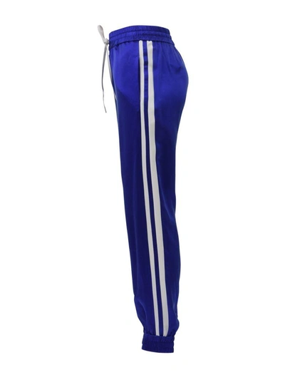 Shop Amiri Silk Jogger Pants In Light Blue