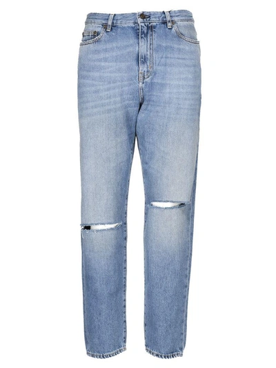 Shop Saint Laurent Ripped Jeans In 4061