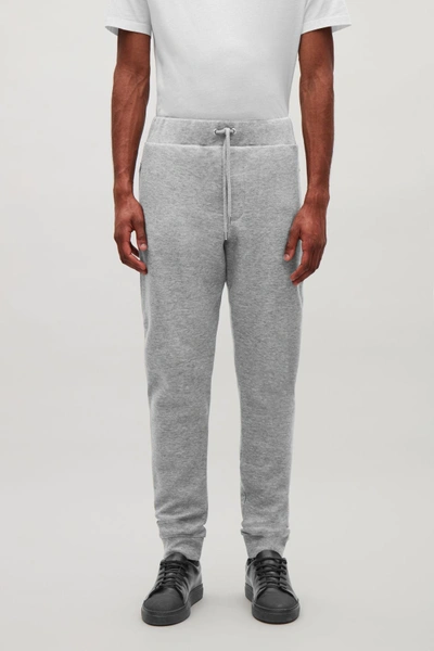 Shop Cos Relaxed Jersey Trousers In Grey