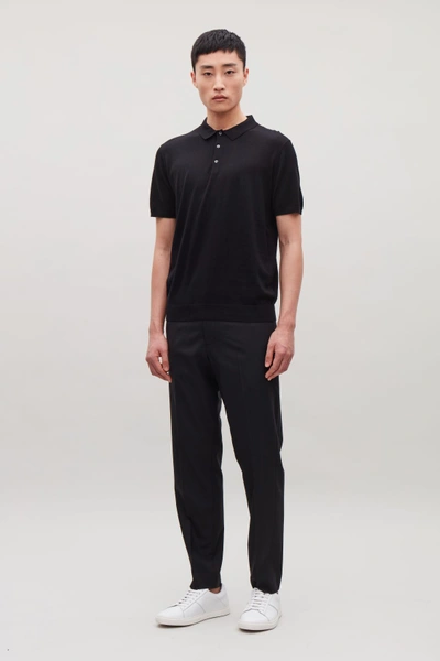 Shop Cos Short-sleeved Knitted Polo In Black