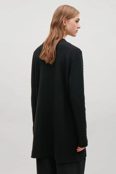 Shop Cos Textured Knit Cardigan In Black