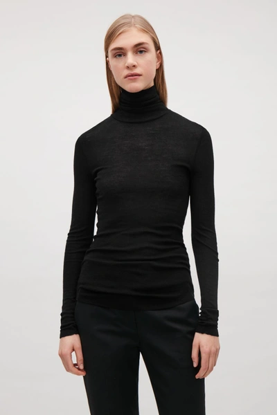 Shop Cos Fine Roll-neck Wool Top In Black