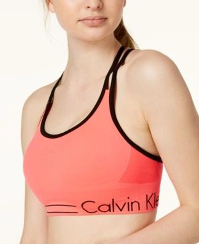 Shop Calvin Klein Performance Strappy-back Low-impact Sports Bra In Ablaze