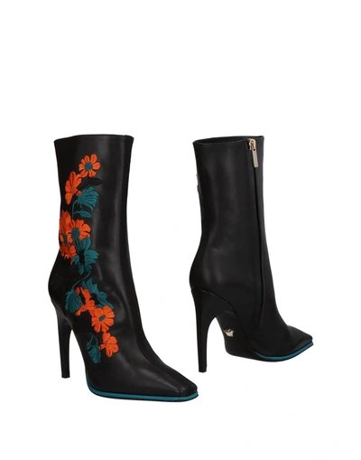 Shop Versace Ankle Boot In Black