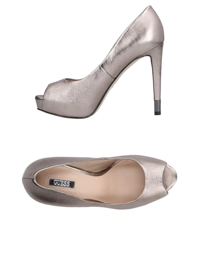 Shop Guess Pumps In Platinum