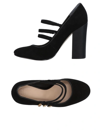 Shop Guess Pumps In Black