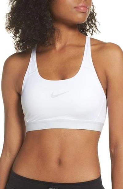 Shop Nike Classic Strappy Sports Bra In White/ Pure Platinum