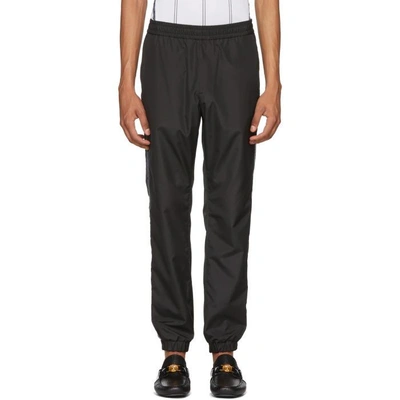 Shop Versace Black Logo Tape Track Pants In A008 Black