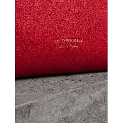Shop Burberry Grainy Leather Wristlet Clutch In Bright Red
