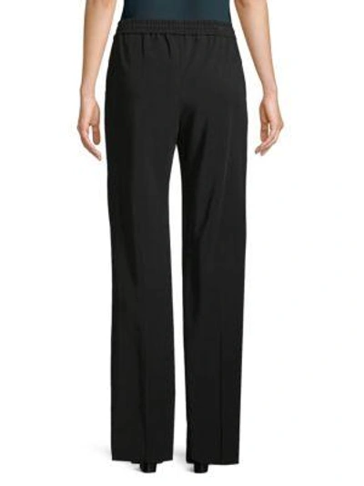 Shop Lanvin Loose-fit Pleated Pants In Black