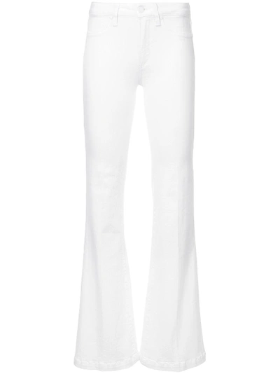 Shop Paige Flared Jeans - White