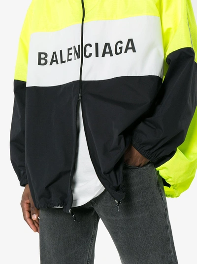 Shop Balenciaga Logo Zip Up Track Jacket In Yellow&orange